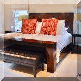 F13. Designer king bed with table footboard. Mattress not included. 